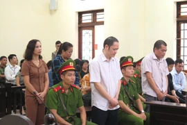 Các bị cáo trong vụ án gian lận điểm thi trung học phổ thông Quốc gia năm 2018 tại Hà Giang trước giờ tuyên án. (Nguồn: TTXVN)