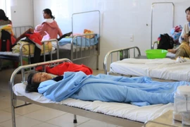 Các bệnh nhi được điều trị tại bệnh viên Đa Khoa Lâm Đồng. (Ảnh: Đặng Tuấn/TTXVN) 