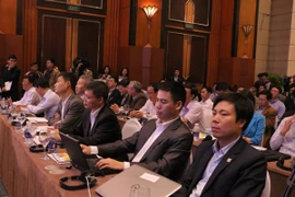 Công bố Báo cáo thường niên Chỉ số Năng lực cạnh tranh cấp tỉnh PCI 2016. (Ảnh: Thi Uyên/Vietnam+)