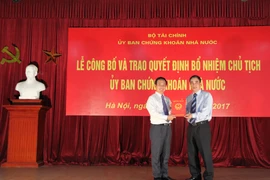 Lễ trao Quyết định bổ nhiệm ông Trần Văn Dũng giữ chức vụ Chủ tịch Ủy ban Chứng khoán Nhà nước, ngày 12/7. (Ảnh: SSC)