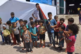 Trẻ em tại trại tị nạn Yarmouk của người Palestine. (Ảnh: Anadolu)