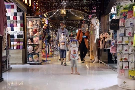 Một khu chợ tại thủ đô Baghdad. (Ảnh: THX/TTXVN)