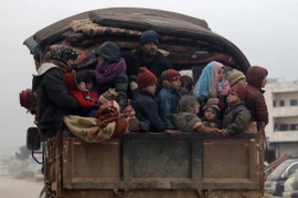 Người dân Syria rời bỏ nhà cửa do xung đột. (Ảnh: Reuters)
