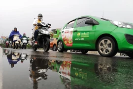 Hà Nội có mưa nhỏ vài nơi. (Ảnh: Thanh Tùng/TTXVN)