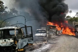 Hiện trường vụ đốt cháy xe ở Antioquia mà ELN bị nghi là thủ phạm. (Nguồn: AFP/TTXVN)