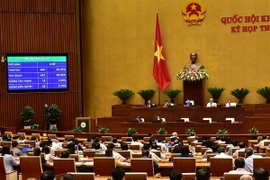 Quốc hội biểu quyết thông qua Luật An ninh mạng với tỷ lệ tán thành 86,86%. (Ảnh: Dương Giang/TTXVN)