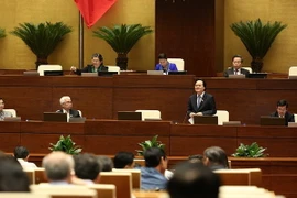 Bộ trưởng Bộ Giáo dục và Đài tạo Phùng Xuân Nhạ giải trình ý kiến của các đại biểu Quốc hội. (Ảnh: Dương Giang/TTXVN)