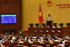 Quốc hội biểu quyết thông qua Luật An ninh mạng với tỷ lệ tán thành 86,86%. (Ảnh: Dương Giang/TTXVN)