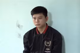 Đối tượng Nguyễn Quốc Huy tại cơ quan điều tra. (Ảnh: TTXVN phát)