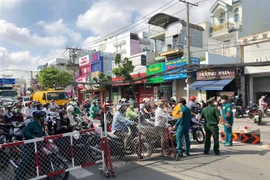 Tình trạng ùn ứ ở các chốt kiểm soát phòng dịch tại Gò Vấp những ngày trước đã không còn. (Ảnh: TTXVN phát)