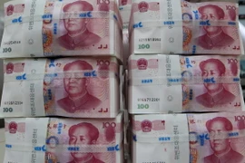 Đồng nhân dân tệ. (Ảnh: Yonhap/TTXVN)