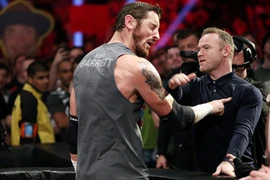 Rooney tát Wade Barrett. (Nguồn: ​WWE.com)