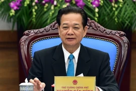 Thủ tướng Nguyễn Tấn Dũng chủ trì hội nghị. (Ảnh: Đức Tám/TTXVN)