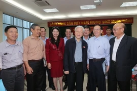 Tổng Bí thư Nguyễn Phú Trọng tiếp xúc cử tri quận Ba Đình và Tây Hồ. (Ảnh: Trí Dũng​/TTXVN)