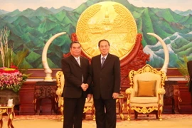 Tổng Bí thư, Chủ tịch nước Lào Chummaly Sayasone tiếp đồng chí Lê Hồng Anh. (Ảnh: Phạm Kiên/TTXVN)