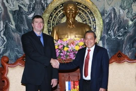 Chánh án Tòa án nhân dân tối cao Trương Hòa Bình tiếp Bộ trưởng Bộ Tư pháp Liên bang Nga Konovalov. (Ảnh: Doãn Tấn/TTXVN)