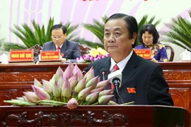 Ông Lê Minh Hoan phát biểu tại phiên bế mạc Đại hội đại biểu Đảng bộ tỉnh Đồng Tháp lần thứ X. (Ảnh: Văn Trí/TTXVN)