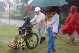 Diễn tập phòng chống rủi ro do thiên tai gây ra. (Ảnh: Hồ Cầu/TTXVN​)