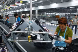 Dây chuyền sản xuất thiết bị điện tử gia dụng tại công ty LG Electronics Việt Nam. (Ảnh: Lâm Khánh/TTXVN)