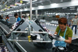 Dây chuyền sản xuất thiết bị điện tử gia dụng tại công ty LG Electronics Việt Nam. (Ảnh: Lâm Khánh/TTXVN)