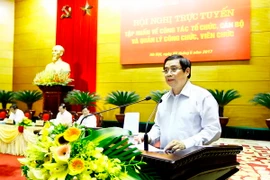 Trưởng Ban Tổ chức Trung ương Phạm Minh Chính phát biểu khai mạc hội nghị. (Ảnh: An Đăng/TTXVN)