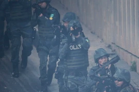 Lực lượng đặc nhiệm Cảnh sát Hoàng gia Malaysia trong buổi diễn tập chống IS ở Kuala Lumpur. (Nguồn: EPA/TTXVN)