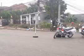 Hiện trường nơi phát hiện thi thể người phụ nữ. (Ảnh: Đậu Tất Thành/TTXVN)