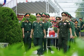 Truy điệu, an táng 6 hài cốt liệt sỹ quân tình nguyện hy sinh tại Lào
