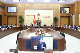 [Photo] Bế mạc Phiên họp thứ 8 của Ủy ban Thường vụ Quốc hội