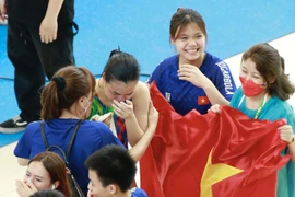 Khoảnh khắc xúc động của VĐV Ngô Phương Mai khi hoàn thành nội dung thi đấu 3m đôi nữ. (Ảnh: Trọng Đạt/TTXVN)