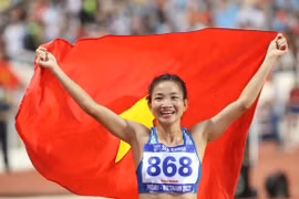 Nguyễn Thị Oanh giành 3 tấm huy chương Vàng SEA Games 31. (Ảnh: Quang Hà/TTXVN)