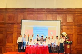 Công ty cổ phần Ximăng VICEM Bút Sơn ký hợp đồng gói thầu số 1 - dự án đầu tư xây dựng công trình tận dụng nhiệt thừa khí thải dây chuyền 1 và 2 để phát điện. (Ảnh: BNEWS/TTXVN)