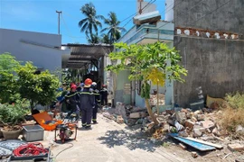 Hiện trường vụ nhà sập khiến 2 người thương vong. (Ảnh: Phan Sáu/TTXVN)
