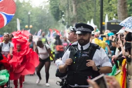 Cảnh sát Anh bảo vệ an ninh trong lễ hội Notting Hill. (Nguồn: EPA/TTXVN)