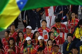 Đoàn vận động viên Trung Quốc tham gia diễu hành tại lễ bế mạc Thế vận hội Rio. (Nguồn: AFP/TTXVN)