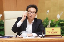 Phó Thủ tướng Chính phủ Vũ Đức Đam, Trưởng Ban Chỉ đạo Quốc gia phòng, chống dịch bệnh viêm đường hô hấp do chủng mới của virus Corona (COVID-19) gây ra phát biểu chỉ đạo cuộc họp. (Ảnh: Doãn Tấn/TTXVN)