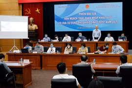 Quang cảnh phiên đấu giá. (Ảnh: Trần Việt/TTXVN)