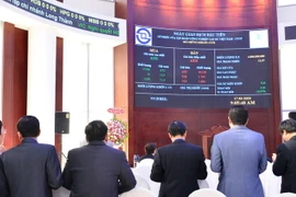 Một phiên giao dịch của cổ phiếu GVR. (Ảnh: Hứa Chung/TTXVN)