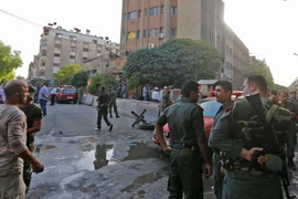 Hiện trường một vụ đánh bom liều chết ở Damascus, Syria ngày 2/10. (Nguồn: AFP/TTXVN)