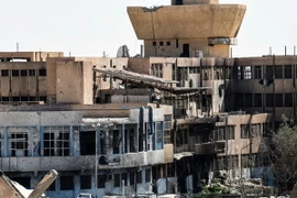Cảnh đổ nát sau một cuộc không kích ở Raqqa ngày 1/10. (Nguồn: AFP/TTXVN)