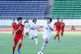 Pha dốc bóng của tiền vệ mang áo số 8, Trần Thị Thu Xuân. (Ảnh: Phạm Kiên/Vietnam+)