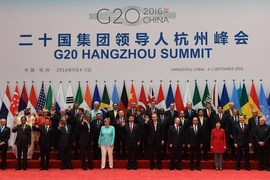 Các nhà lãnh đạo G20 chụp ảnh chung tại hội nghị. (Nguồn: AFP/TTXVN)