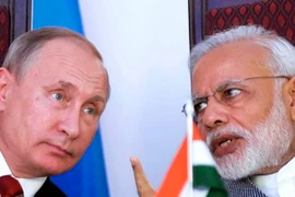 Tổng thống Nga Vladimir Putin và Thủ tướng Ấn Độ Narendra Modi (phải). (Nguồn: The Indian Express)