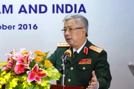 Thượng tướng Nguyễn Chí Vịnh, Thứ trưởng Bộ Quốc phòng phát biểu tại hội nghị. (Ảnh: An Đăng/TTXVN)