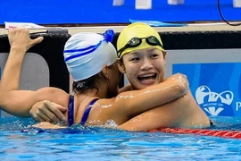 Vận động viên Trịnh Thị Bích Như giành Huy chương vàng tại ASEAN Para Games 2011. (Nguồn: Swimming World Magazine/TTXVN) 