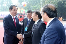 Chủ tịch nước Trần Đại Quang với các lãnh đạo chủ chốt của Tổng Liên đoàn Lao động Việt Nam. (Ảnh: Nhan Sáng/TTXVN) 