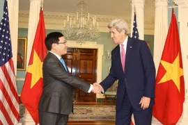 Phó Thủ tướng, Bộ trưởng Ngoại giao Phạm Bình Minh hội đàm với Ngoại trưởng Mỹ J.Kerry . (Ảnh: Thanh Tuấn/TTXVN)