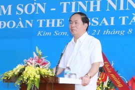 Chủ tịch nước Trần Đại Quang phát biểu tại Lễ khánh thànhTrường Trung học Phổ thông Kim Sơn C. (Ảnh: Nhan Sáng/TTXVN)