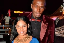 Siêu sao điền kinh Usain Bolt và bạn gái. (Nguồn: dailymail.co.uk)