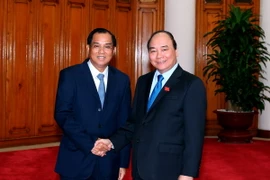 Thủ tướng Nguyễn Xuân Phúc tiếp Bộ trưởng Kế hoạch và Đầu tư Lào Su Phan Keo My Xay. (Ảnh: Thống Nhất/TTXVN) 